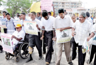 සත්‍යග්‍රහයේ නිරත විශ්‍රාමික ආබාධිත රණවිරුවන්ගේ ඉල්ලීම්වලට ධනාත්මක තීන්දුවක්